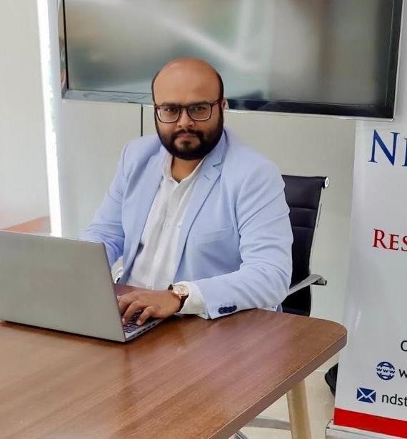 Nirav Desai, SEBI Registered Research Analyst, working at his desk